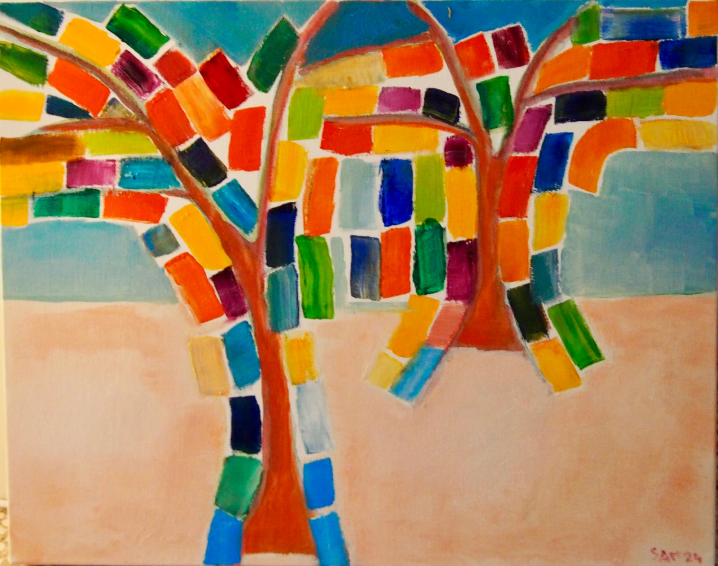 Abstract oil painting of trees with colorful squares and peach and blue background.